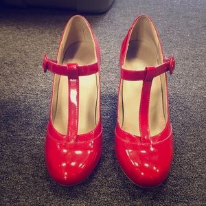 Red leather buckle shoes